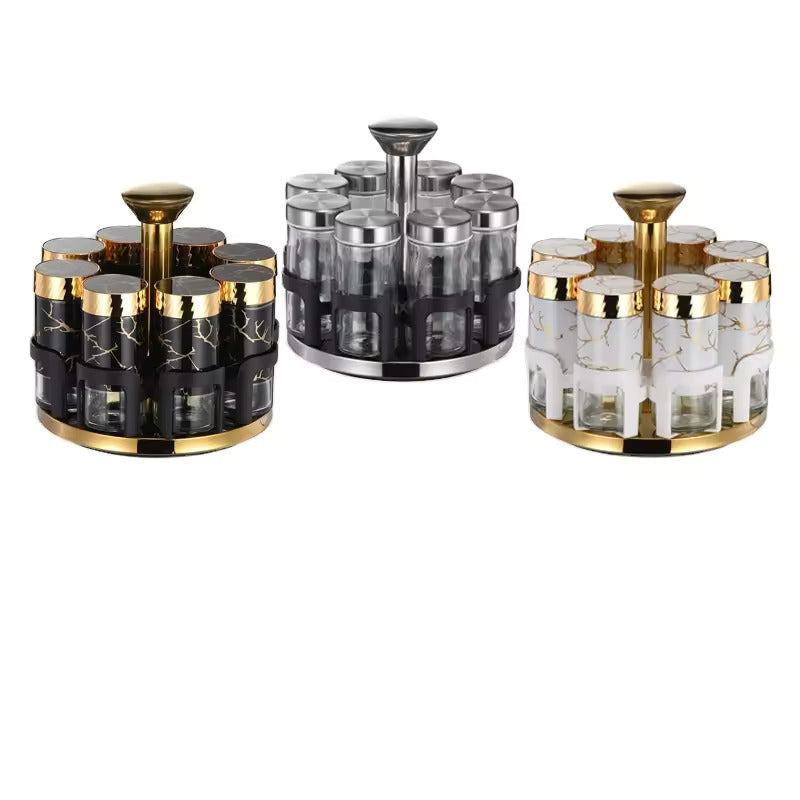Spice rack with black and gold containers on a white background